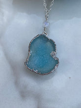 Sterling silver necklace with a blue druzy pendant