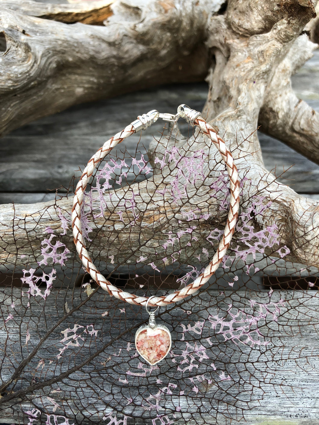 Leather bracelet with a Bermuda pink sand heart charm